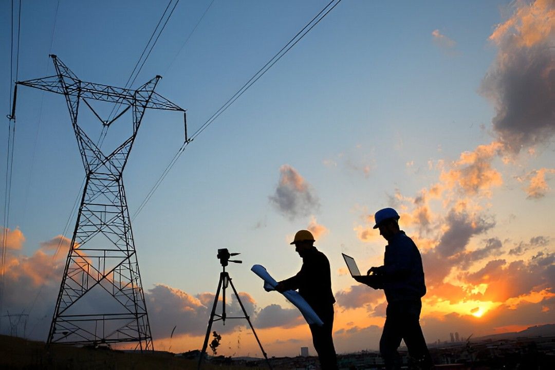 electrical wires exposed in the cut out in a wall for a rewiring